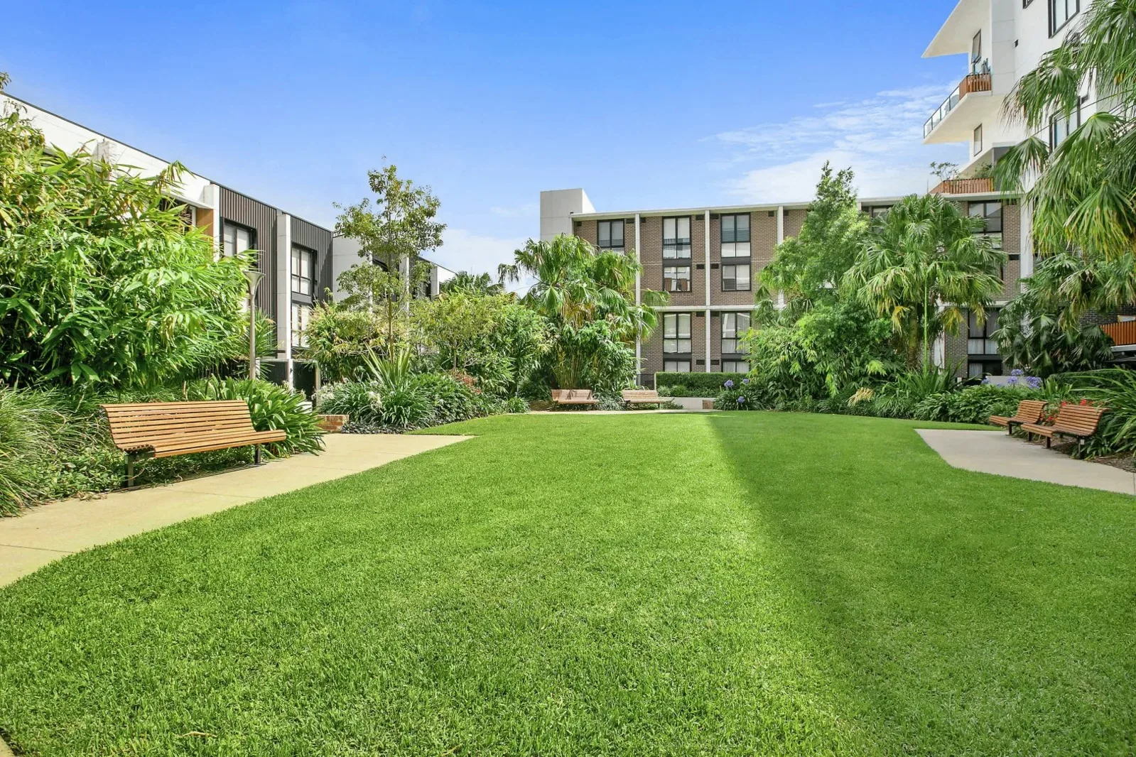 Apartment complex with landscaped garden